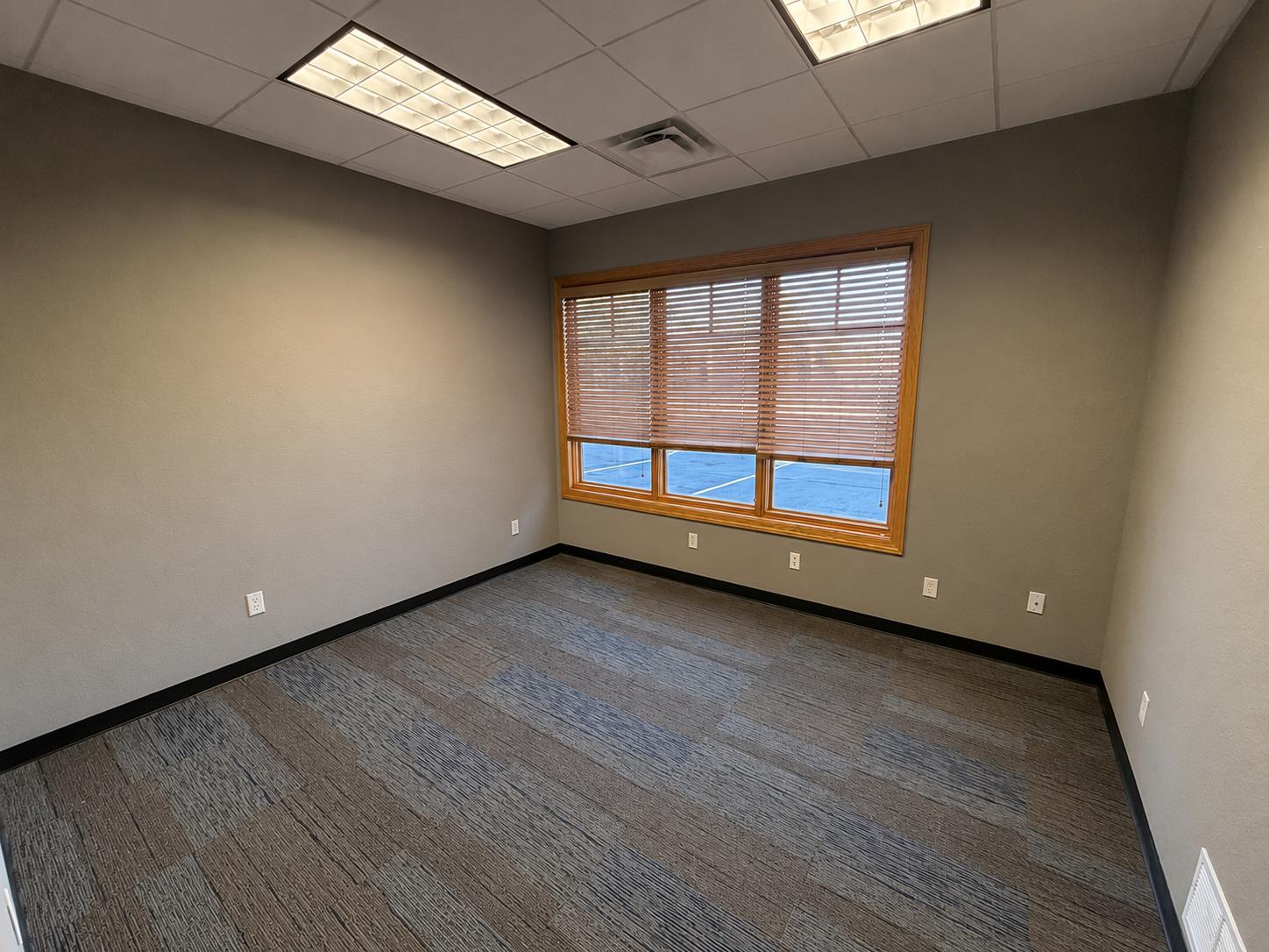 Suite 150 — private window office at Rochester Executive Suites, first floor of the 3265 building