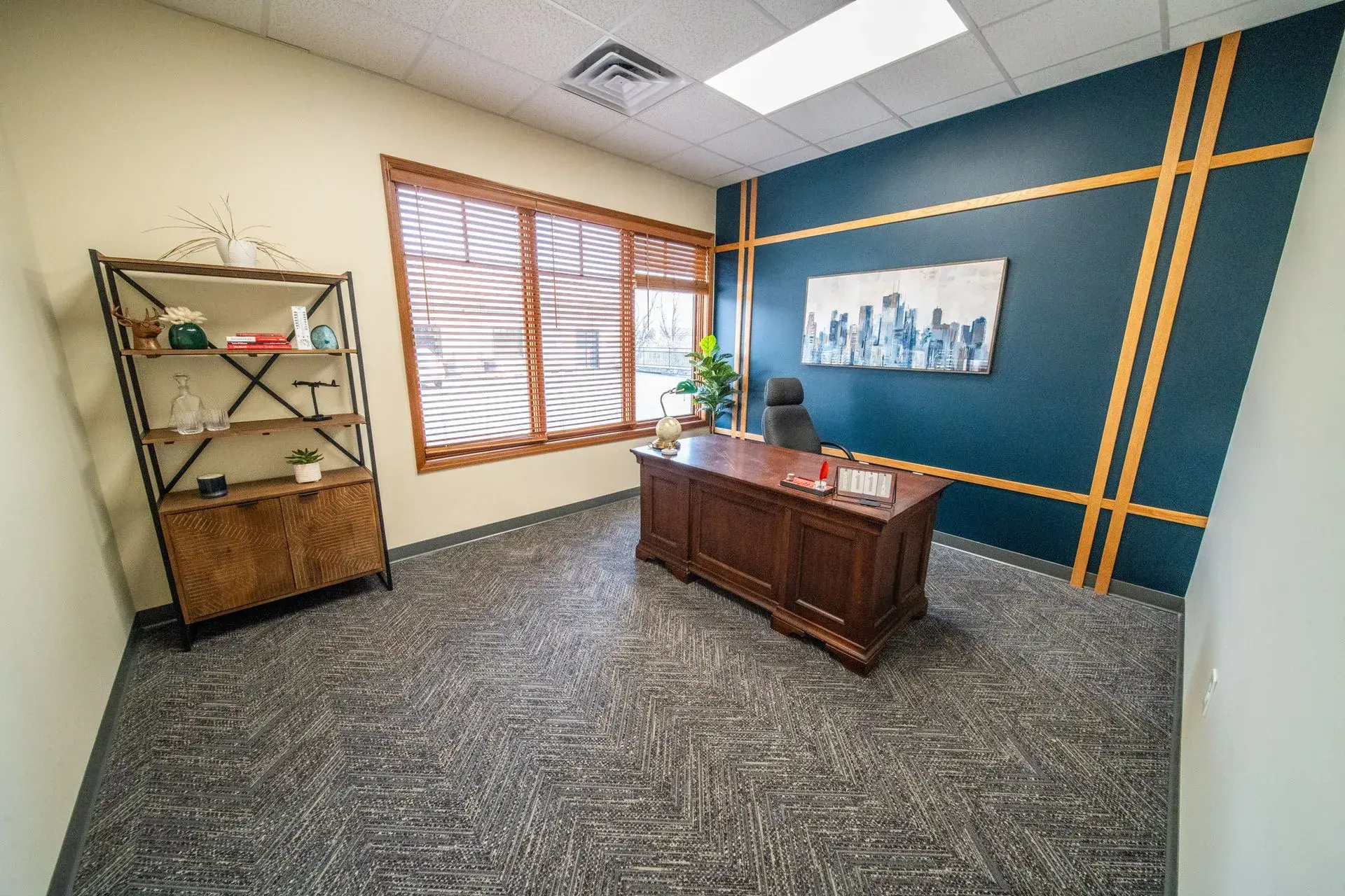 Staged interior of Suite 130, furnished private office