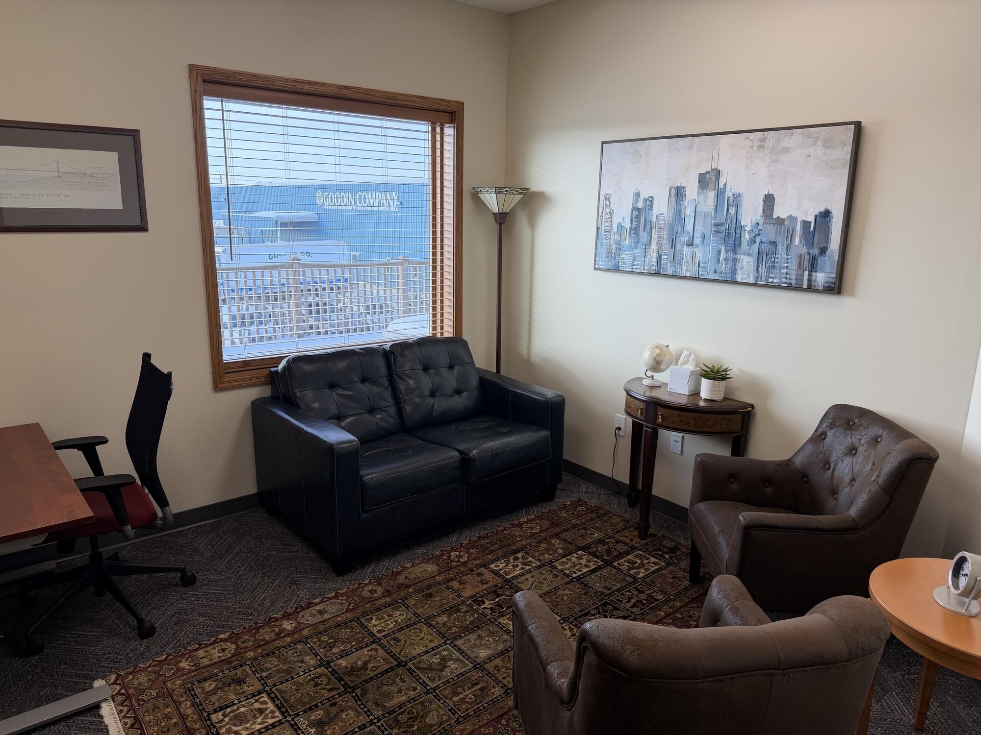 Suite 320 — hourly private office at Rochester Executive Suites with a sit/stand desk and ergonomic chair